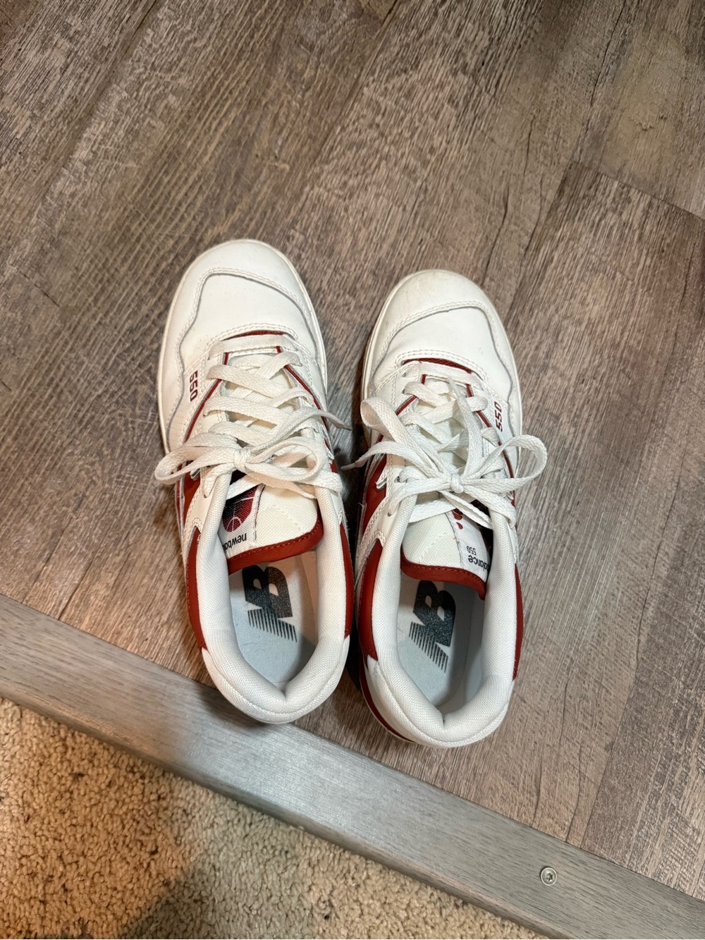 New Balance womens White with Red Accent Athletic Sneakers